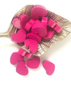 grosse perles bois coeur fuchsia pour bijoux bracelet collier porte clés attache tetine